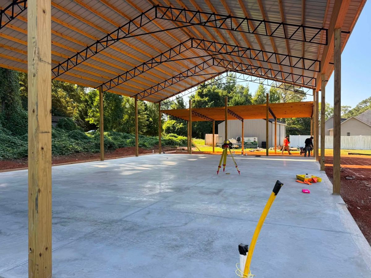 A smooth finished slab under a pole barn